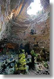 caves, ceilings, europe, glow, grotte di castellana, italy, lights, limestone, materials, opening, perspective, puglia, rocks, stalactites, stalagmites, stones, upview, vertical, photograph