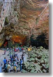 caves, europe, gathering, grotte di castellana, italy, limestone, materials, people, puglia, rocks, stalactites, stalagmites, stones, vertical, photograph
