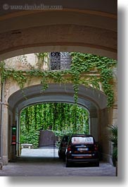 archways, cars, europe, italy, ivy, lecce, puglia, vertical, photograph