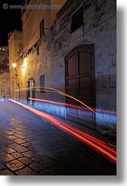 images/Europe/Italy/Puglia/Matera/Town/cobblestone-narrow-street-w-car-light-streaks.jpg