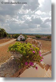 churches, clouds, europe, italy, masseria murgia albanese, noci, plants, puglia, vertical, photograph