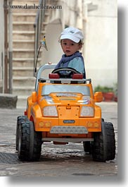 electric, europe, italy, noci, people, puglia, toddlers, trucks, vertical, photograph