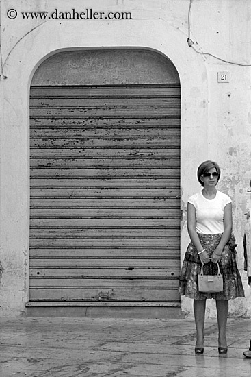 woman-standing-by-door-bw.jpg