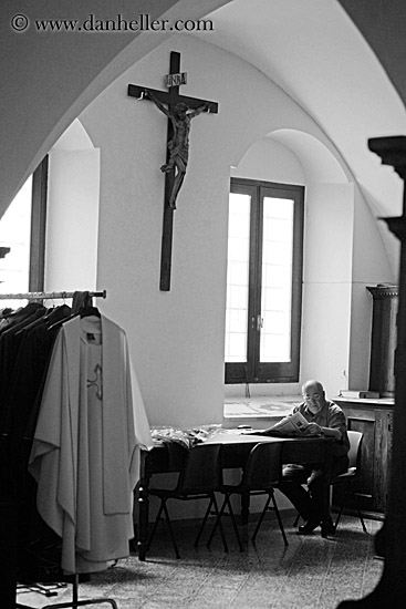 priest-reading-paper-bw.jpg