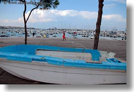 blues, boats, europe, horizontal, italy, men, puglia, seaside, walking, photograph