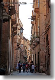 alleys, europe, italy, narrow, people, puglia, taranto, towns, vertical, walking, photograph