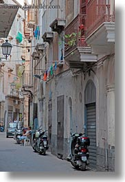 europe, italy, motorcycles, parked, puglia, taranto, towns, vertical, photograph