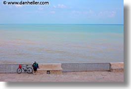 bicycles, europe, horizontal, italy, men, ocean, people, puglia, trani, photograph