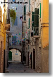 colorful, europe, flags, italy, narrow, puglia, streets, trani, vertical, photograph