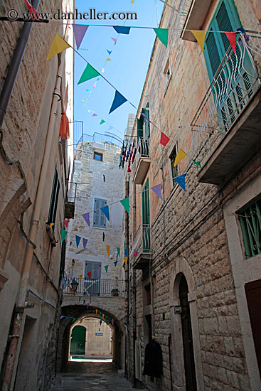 narrow-street-w-colorful-flags-2.jpg