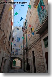 colorful, europe, flags, italy, narrow, puglia, streets, trani, vertical, photograph