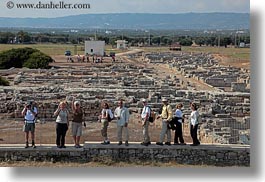 architectural ruins, europe, groups, horizontal, italy, looking, people, puglia, roman, tourists, photograph