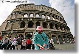 architectural ruins, archways, buildings, colosseum, crowds, europe, horizontal, italy, landmarks, looking, people, perspective, rome, structures, upview, womens, photograph