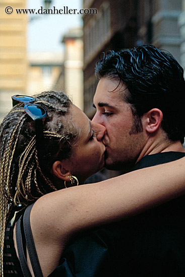 man-kissing-woman-w-braided-hair-1.jpg