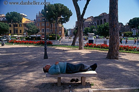man-lying-on-stone-bench-1.jpg
