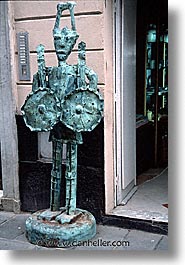 alghero, copper, europe, italy, sardinia, statues, streets, vertical, photograph