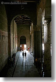 arches, archways, basilica san miniato, basillica, buildings, churches, europe, florence, italy, people, pillars, silhouettes, slow exposure, tourists, tuscany, under, vertical, walking, photograph