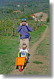 babies, boys, childrens, europe, fathers, fattoria lavacchio, italy, jacks, men, toddlers, towns, tuscany, vertical, wheel barrow, photograph