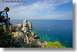 europe, hats, hiking, horizontal, isola giglio, italy, men, ocean, overlook, scenics, towns, tuscany, photograph