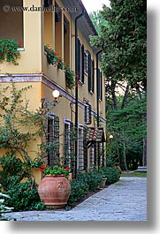 buildings, europe, hotels, italy, la bandita, lamp posts, towns, tuscan, tuscany, vertical, villa, photograph