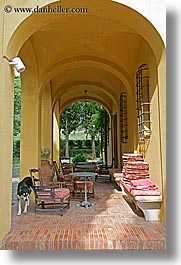 archways, bricks, chairs, europe, hotels, italy, la bandita, patio, towns, tuscany, vertical, villa, photograph