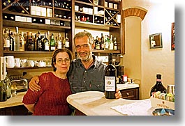 bars, europe, horizontal, hotel albergo giglio, hotels, italy, men, montalcino, owners, red wine, slow exposure, towns, tuscany, wines, womens, photograph