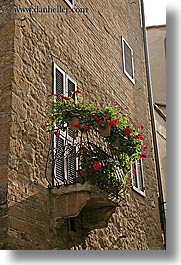 balconies, europe, flowers, italy, pienza, plants, towns, tuscany, vertical, photograph