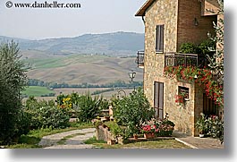 europe, flowers, horizontal, houses, italy, pienza, plants, scenics, towns, tuscany, photograph