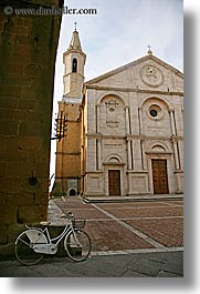 bell towers, bicycles, churches, europe, italy, pienza, religious, towns, tuscany, vertical, white, photograph