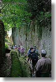 architectural ruins, cuts, etruscan, etruscan cuts, europe, hikers, hiking, italy, people, pitigliano, towns, tuscany, vertical, photograph