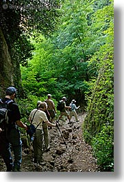 architectural ruins, cuts, etruscan, etruscan cuts, europe, hikers, hiking, italy, people, pitigliano, towns, tuscany, vertical, photograph