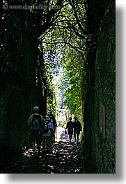 architectural ruins, cuts, etruscan, etruscan cuts, europe, hikers, hiking, italy, people, pitigliano, silhouettes, towns, tuscany, vertical, photograph