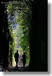 architectural ruins, cuts, etruscan, etruscan cuts, europe, hikers, hiking, italy, people, pitigliano, silhouettes, towns, tuscany, vertical, photograph