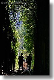 architectural ruins, cuts, etruscan, etruscan cuts, europe, hikers, hiking, italy, people, pitigliano, silhouettes, towns, tuscany, vertical, photograph