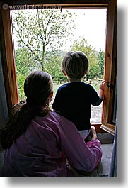 babies, boys, childrens, europe, italy, jacks, jills, mothers, poderi di coiano, toddlers, towns, tuscany, vertical, windows, womens, photograph