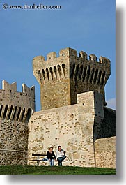 benches, castles, couples, europe, fortress, italy, populonia, towns, tuscany, vertical, photograph