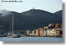 boats, europe, horizontal, italy, passing, porto ercole, towns, tuscany, photograph