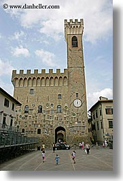buildings, castles, childrens, europe, facades, fortress, italy, palace, play, scarperia, stones, towns, tuscany, vertical, photograph
