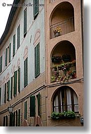 europe, flowers, geraniums, italy, siena, towns, tuscany, vertical, windows, photograph