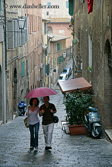 couple-walking-w-umbrella-3.jpg