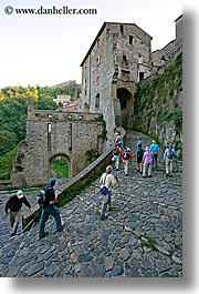 cobblestones, europe, italy, people, sorano, streets, tourists, towns, tuscany, vertical, walking, photograph