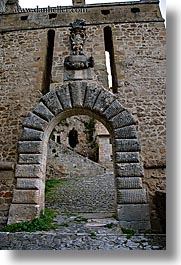arches, archways, cobblestones, europe, italy, sorano, stones, towns, tuscany, vertical, photograph