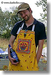 apron, europe, happy, hats, italy, leaders, men, olive oil, posing, roberto, tourists, tuscany, vertical, wines, photograph