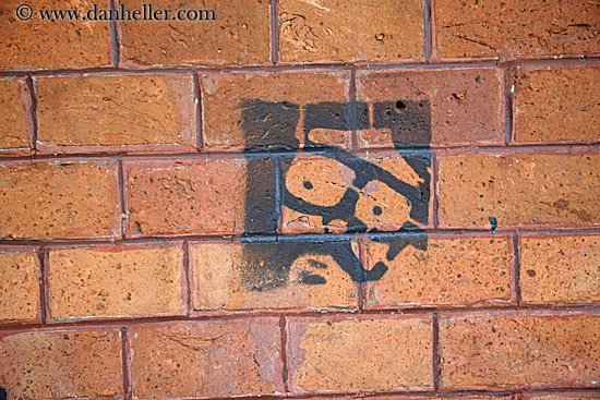 face-stencil-on-brick.jpg