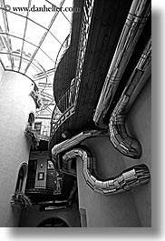 atrium, black and white, buildings, copernicus, ducts, europe, hotels, krakow, pipes, poland, vertical, photograph