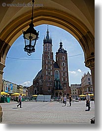archways, basilica, basilica virgin mary, christian, churches, europe, krakow, lamp posts, mary, poland, religious, structures, vertical, virgin, photograph