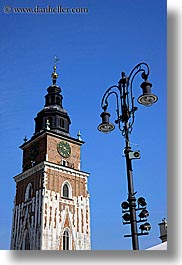 buildings, clock tower, clocks, europe, krakow, lamp posts, poland, structures, towers, vertical, photograph