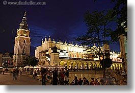 buildings, clock tower, crowds, europe, horizontal, krakow, nite, people, poland, slow exposure, squares, structures, towers, photograph