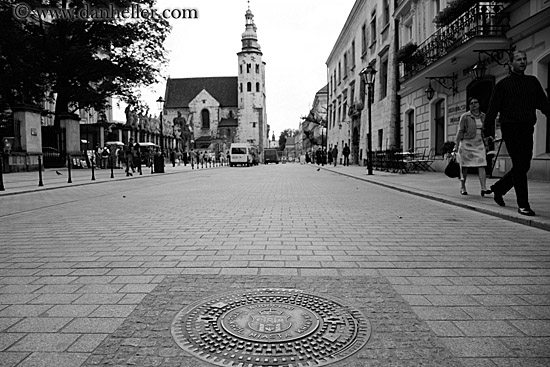 krakow-manhole-cover-n-church-bw-1.jpg