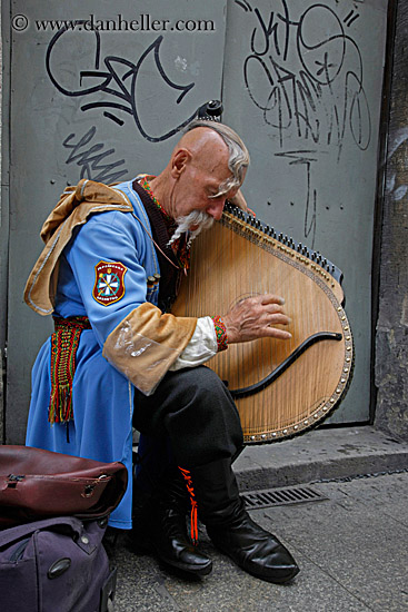 man-playing-odd-harp-3.jpg